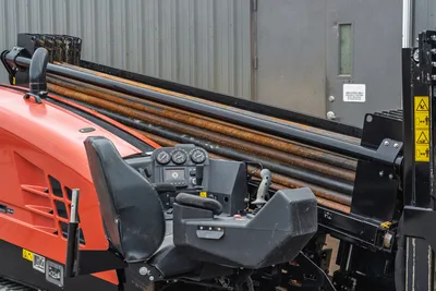 Ditch Witch JT20 cab and drill pipe rack detail, 17,000 lbs thrust, 2.06" drill pipe, operator controls visible