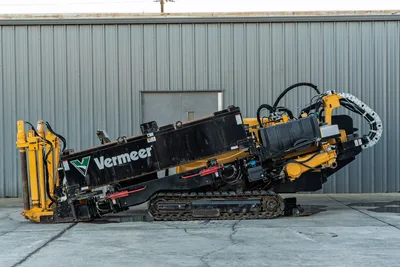 2019 Vermeer D40x55 S3 HDD drill angled down, side view, rubber tracks, drill frame, hydraulic lines, pipe loader visible