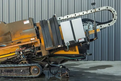 2021 Vermeer D23x30 S3 HDD rig rear/side view, elevated drill frame, cable track, hydraulic lines, rubber tracks visible
