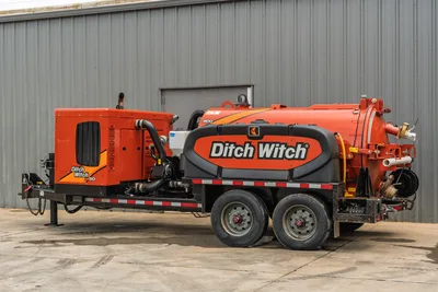 2023 Ditch Witch HX50 mud recycler, trailer-mounted, side view; engine enclosure, slurry tank, vacuum inlet visible