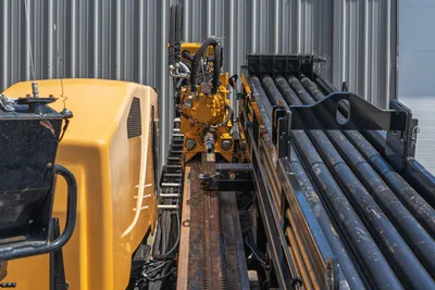 2019 Vermeer D40x55 S3 HDD drill head, carriage, rack-and-pinion thrust frame, and loaded pipe rack with 2.625" drill pipe