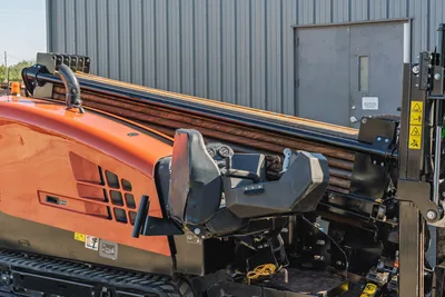 2023 Ditch Witch JT20 side profile, featuring drill pipe rack, operator station, and tracks in solid condition.