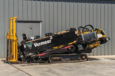 2020 Vermeer D24x40 S3 HDD drill angled upward on rubber tracks, Vermeer logo visible, hydraulic lines, pipe loader, operator seat exposed