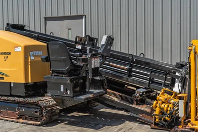 2019 Vermeer D40x55 S3 HDD drill, operator seat, loaded pipe rack, carriage assembly, rubber tracks, side profile view