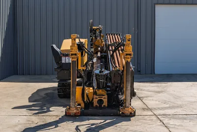 2021 Vermeer D40x55 S3 HDD drill, rear view showing pipe rack loaded with drill rods, anchor posts, spindle, and hydraulic lines