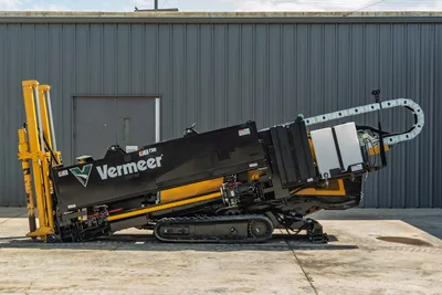 Vermeer D23x30 S3 HDD drill, driver-side view, drill frame angled up, yellow pipe loader, rubber tracks, cable tray, clean low-hour condition