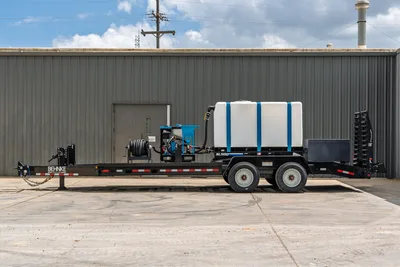 2026 Behnke CBCT2324E-BT-R HDD mud mixing trailer, side view, SL500 mixer, water tank, hose reel, dual axle, pipe rack