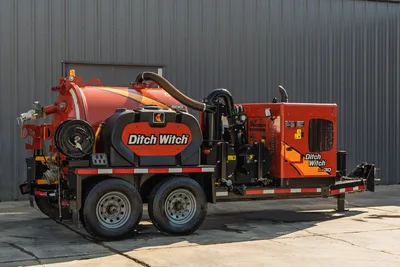 2022 Ditch Witch HX30 vacuum excavator, rear 3/4 view, tandem-axle trailer, debris tank, water tank, engine compartment, vacuum hose