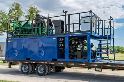 2023 American Augers M300DH mud recycling system on trailer, blue tank, green shaker screens, pump manifold, access stairs visible