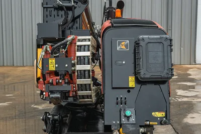 Rear view of 2018 Ditch Witch JT20 HDD showing engine compartment, drill pipe feed system, hydraulic lines, and tracks.
