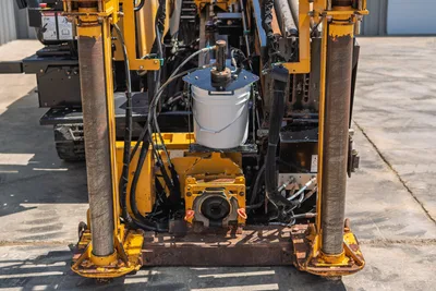 2020 Vermeer D24x40 S3 drill frame closeup showing vise assembly, anchor legs, hydraulic lines, and spindle with bucket