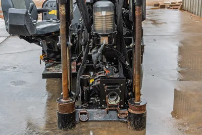 Ditch Witch JT20 rear view showing 2.06" drill pipe, engine compartment, rotational torque drive, and operator cab with 17,000 lbs thrust capacity