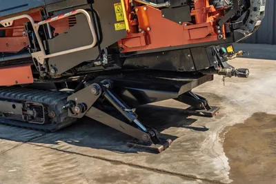 2018 Ditch Witch JT20 HDD underside view showing rubber tracks, hydraulic stabilizers, and drill frame in good condition.