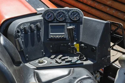 2021 Ditch Witch JT20 operator station featuring control console with analog gauges, digital display, and joystick controls.