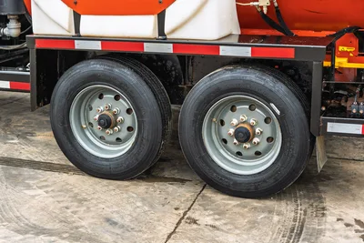 2019 Ditch Witch HX30 vacuum excavator dual-axle trailer, profile view showing mud equipment chassis and tire condition.