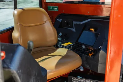 Interior cab view of 2016 Ditch Witch JT30 All Terrain HDD rig showing operator seat and control console switches.
