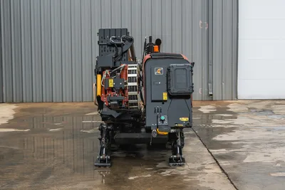Rear view of 2018 Ditch Witch JT20 HDD rig showing engine compartment, drill pipe rack, manifold, and hydraulic stabilizers.