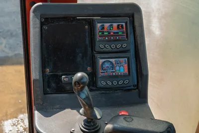 2017 Ditch Witch JT30 operator console with dual color LCD displays, joystick controls, and engine RPM/drill gauges visible