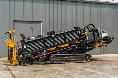 2014 Vermeer 24x40 Series II HDD drill with track undercarriage, drill pipe rack, stabilizers, and engine compartment.