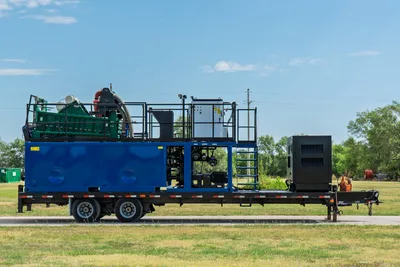 2023 American Augers M300DH mud recycler, full driver-side profile, blue tank, green shaker, pump skid, control panel, ladder, trailer-mounted