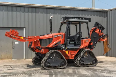 2024 Ditch Witch RT125Q tracked ride-on trencher, enclosed cab, RC30 boom, rear attachment, 3/4 front angle view