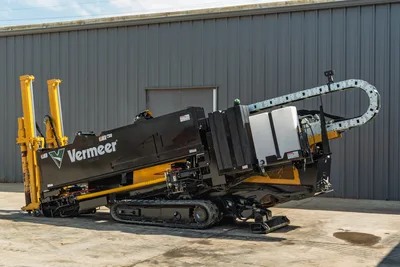 2022 Vermeer D23x30 S3 HDD drill, 3/4 rear angle, rubber tracks, elevated drill frame, pipe loader, cable chain visible