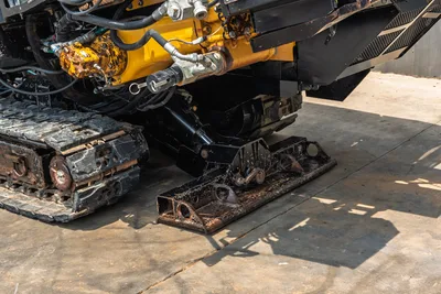 Vermeer 24x40 Series II HDD drill: closeup of hydraulic motor, engine compartment, undercarriage, and front anchor stabilizer.