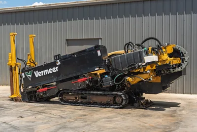 2021 Vermeer D24x40 S3 HDD drill, 3/4 passenger-side view, rubber tracks, pipe rack, exposed hydraulics, black engine cowling, yellow frame