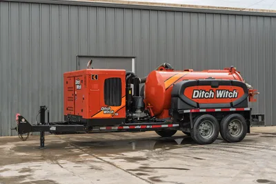2023 Ditch Witch HX75 mud recycler on tandem-axle trailer, 3/4 rear view, orange mixing tank, pump unit, hose connections visible