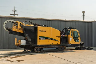 2017 Vermeer D100x140 S3 Navigator HDD drill, full profile view, yellow cab, raised drill frame, hydraulic hoses, rubber tracks