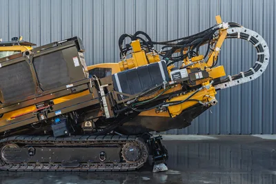 Vermeer 40x55DR S3 HDD rig with 40,000 lbs thrust, tracked carrier, drill head, hydraulic lines, and radiator assembly