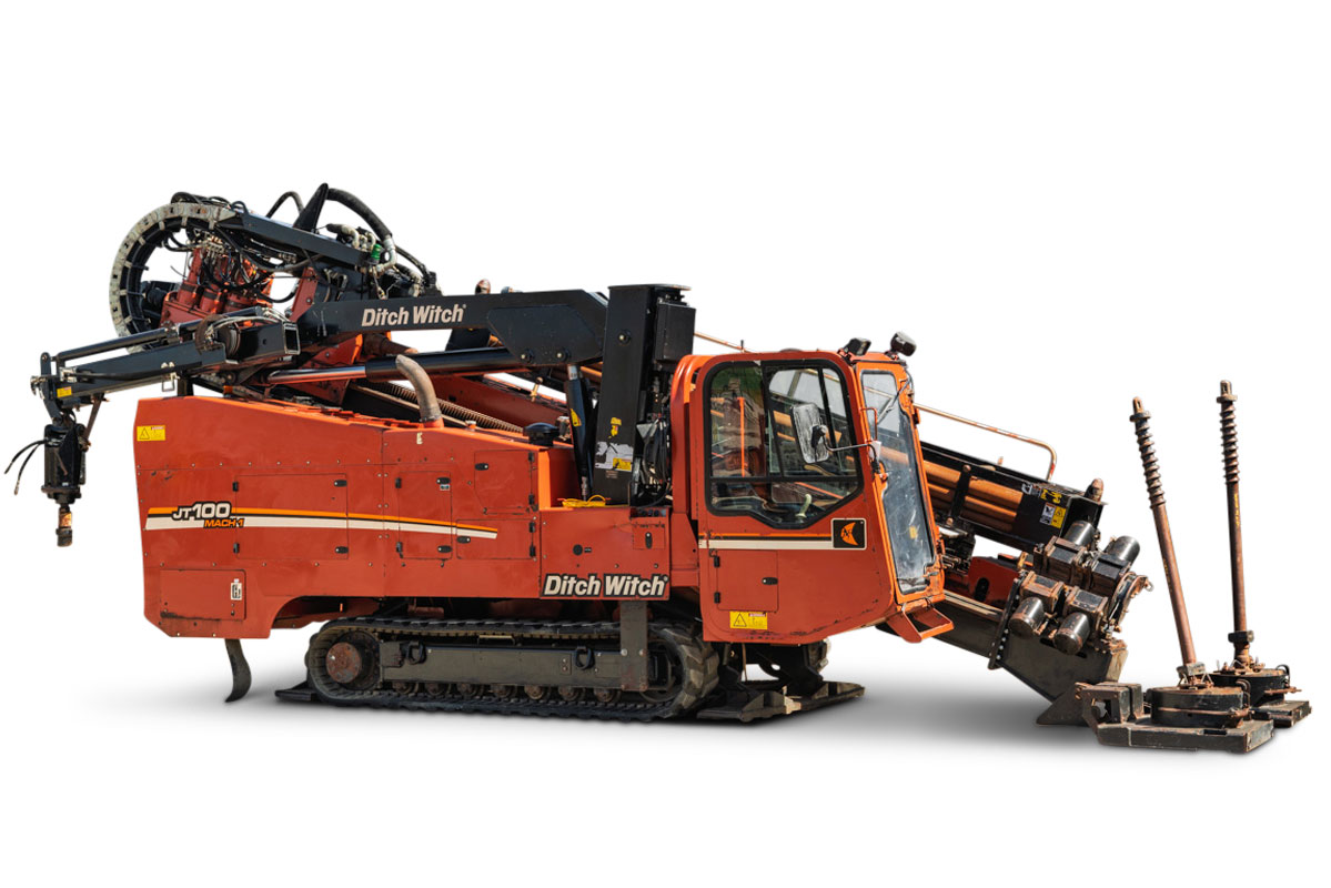 2014 Ditch Witch JT100 Mach 1 HDD rig, side view, rubber tracks, enclosed cab, pipe loader, drill stem, anchor system visible