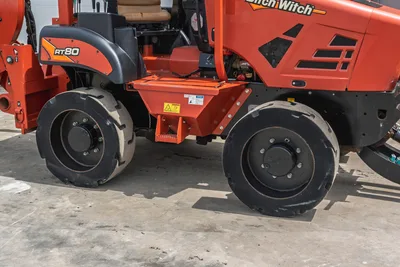 Side profile of 2017 Ditch Witch RT80 utility trencher showing engine cowling, operator station, and heavy-duty tires.