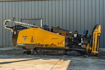 2021 Vermeer D23x30 S3 Navigator HDD rig, side profile, yellow paint, rubber tracks, drill pipe carousel, cable chain visible