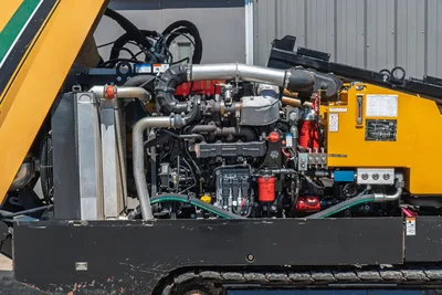 2020 Vermeer D24x40 S3 engine compartment open, showing turbocharged diesel, intercooler, hydraulic manifold, and radiator