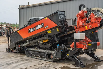 2021 Ditch Witch AT40 All Terrain directional drill with raised drill rack, steel tracks, and rotary drive assembly.