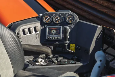 2023 Ditch Witch JT20 operator station, digital display, gauges, and controls from a high-angle cockpit perspective.