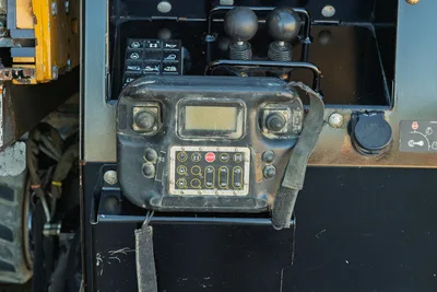 2021 Vermeer D23x30 S3 operator control panel with LCD display, dual joysticks, function buttons, and auxiliary port; worn condition