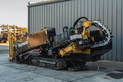 2019 Vermeer D40x55 S3 HDD drill, side angle, rubber tracks, drill frame raised, vise assembly, hydraulic hoses, cable carrier visible