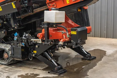 2021 Ditch Witch AT40 All Terrain mud pump assembly, anchor stabilizers, and tracks in close-up side profile view.
