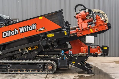 2021 Ditch Witch AT40 All Terrain directional drill side profile, view showing rotational torque head, tracks, and hydraulics.