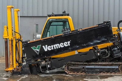 Side view of 2017 Vermeer 40x55 S3 HDD showing drill rack, operator cab, structural housing, and hydraulic track assembly.