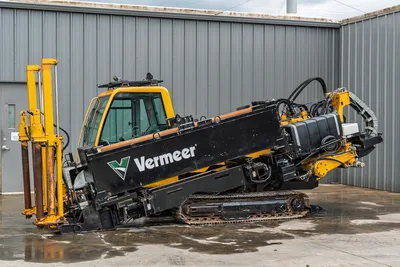 2017 Vermeer 40x55 S3 horizontal directional drill, side profile view showing enclosed cab, steel tracks, and drill rack.