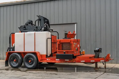 2015 Ditch Witch MR90 mud recycler on tandem-axle trailer, 3/4 view, white water tank, mixing hopper, engine compartment, mixer arm