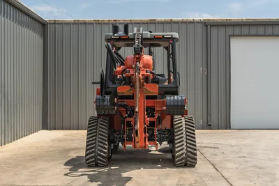 2024 Ditch Witch RT125Q rear view, rubber tracks, plow blade assembly, hydraulic hoses, ROPS canopy, low hours