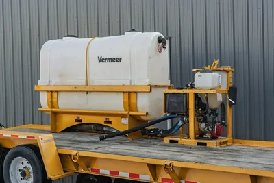 Vermeer MX125 mud mixer on 2021 TowMaster T-20D trailer; white poly tank, yellow frame, Honda engine, mixing hopper, hoses visible