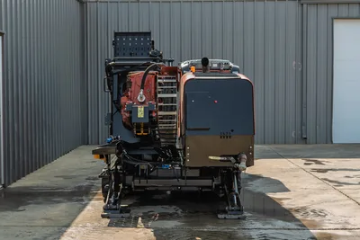 2017 Ditch Witch JT30 HDD drill, rear view, exposed engine compartment, red powerplant, exhaust stack, tracks, hydraulic components visible