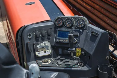 2017 Ditch Witch JT20 operator console showing ESID display, thrust/pullback/torque gauges, joystick, and toggle switches